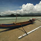 Lombok Island, Gili Meno Island, fisherman's canoe, sandy beach, seascape, cumulus nimbus cloud, Indonesia, Southest Asia, travel, tourism, travel photo, free photo, stock photo, stock photography, free picture, royalty-free image